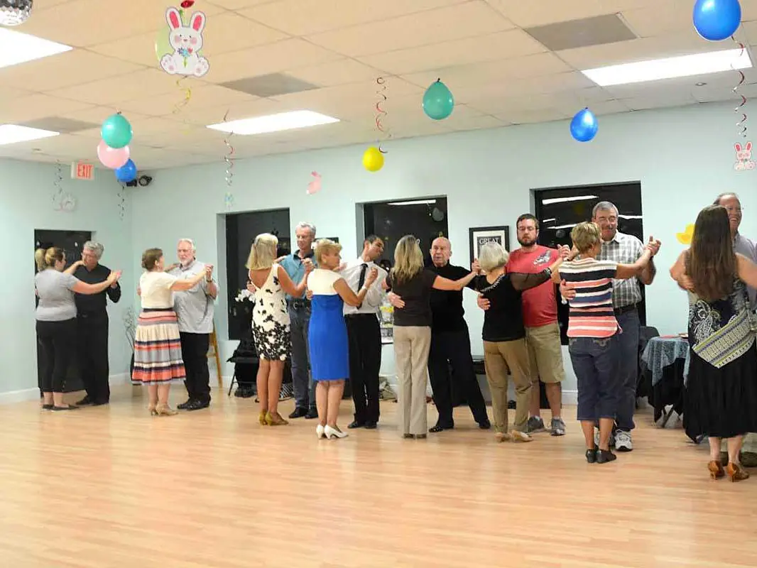 Couples dancing together at a Dance Passion group class
