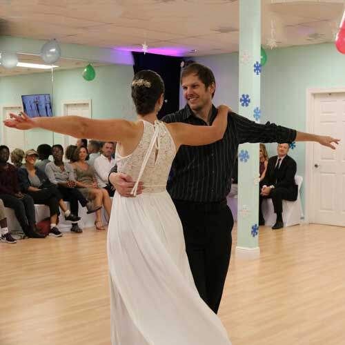 Wedding couple practicing their first dance