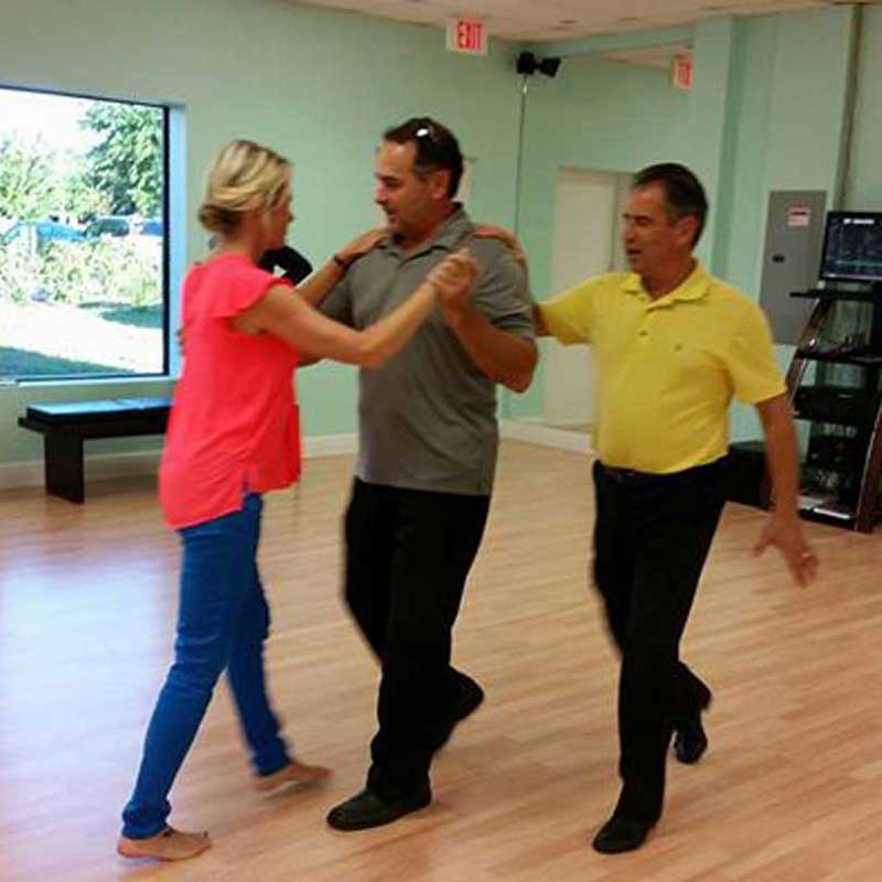 A couple dancing together at Dance Passion in St. Petersburg
